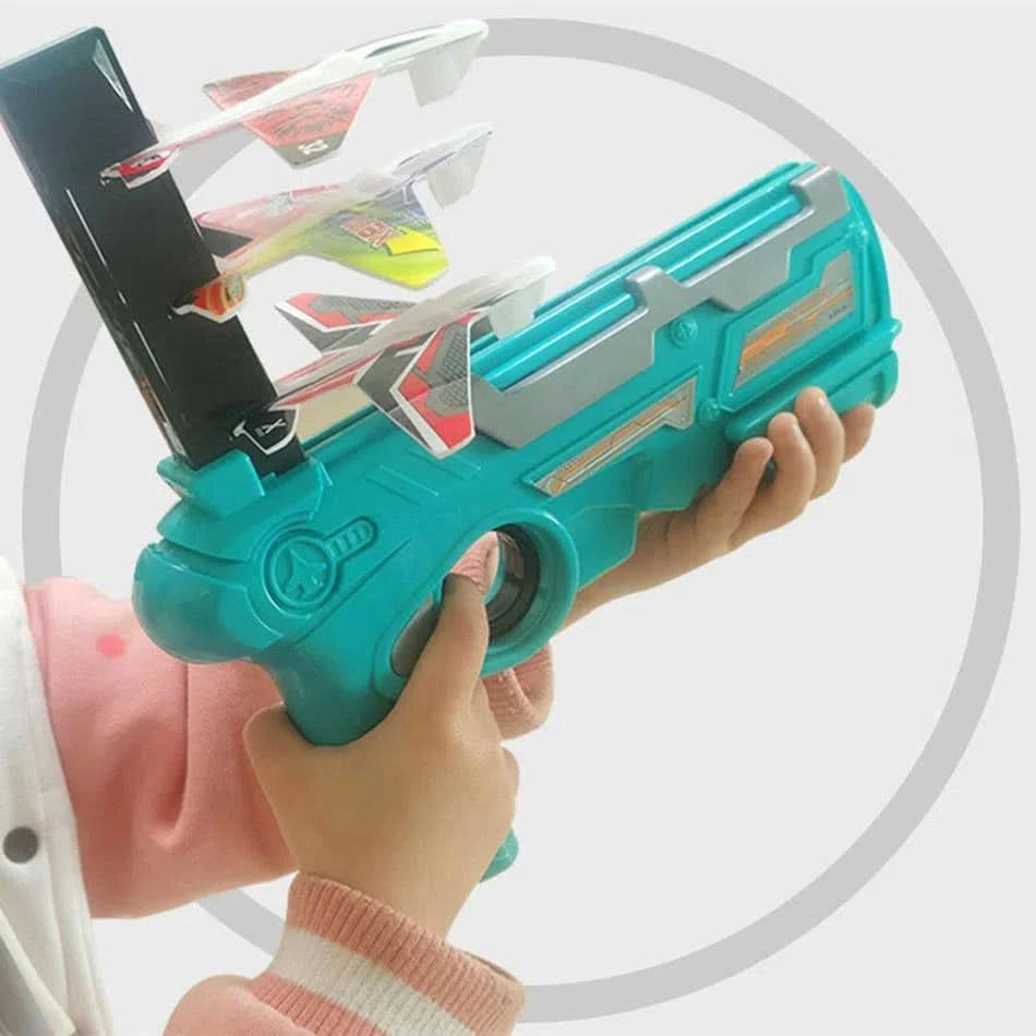 Lanza Aviones con Forma de Pistola + 3 Aviones.