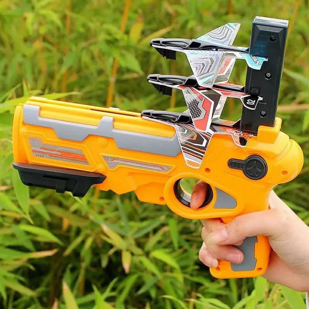 Lanza Aviones con Forma de Pistola + 3 Aviones.